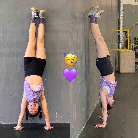 Mengyang doing a handstand in a gym.